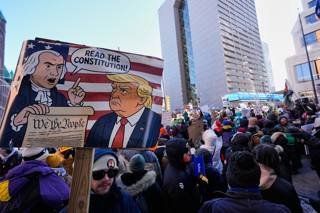 People gather during a protest Friday, Jan. 30, 2026, in Minneapolis. (AP Photo/Alex Brandon)