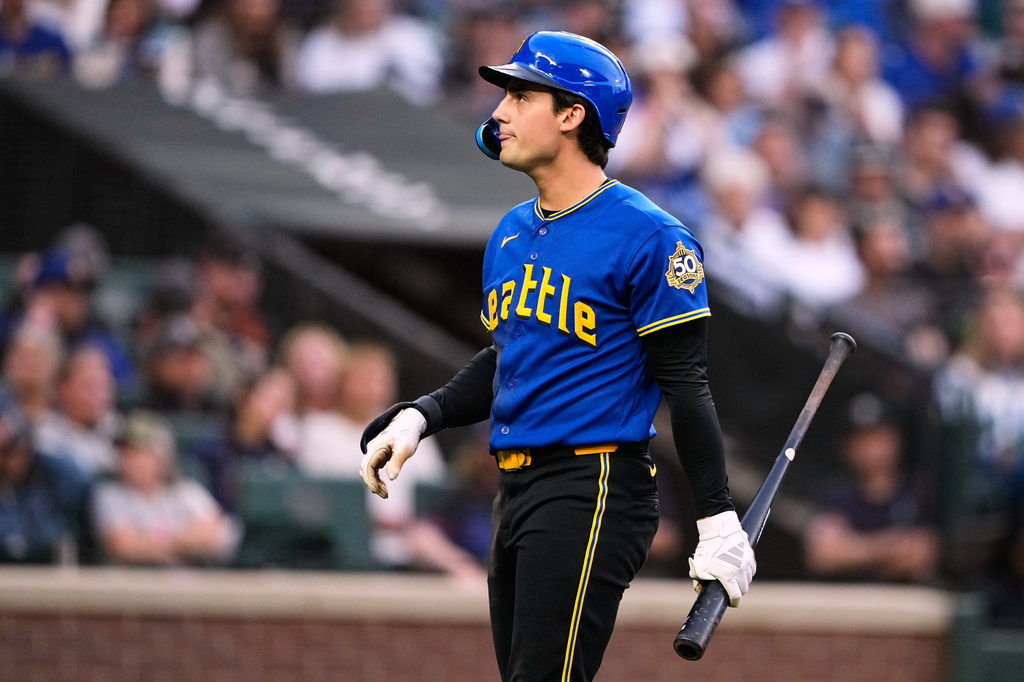 Seattle Mariners' Cole Young react after striking out against the Toronto Blue Jays during the fifth inning of a baseball game, Friday, July 3, 2026, in Seattle. (AP Photo/Lindsey Wasson)