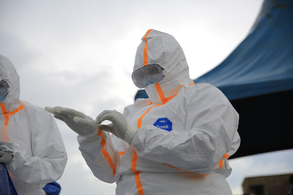 Ebola response teams organize a public demonstration to raise awareness about the Ebola virus disease in Beni, North Kivu province, eastern Congo, Tuesday, Sept. 22, 2026. (AP Photo/Sebastien Kitsa Musayi)