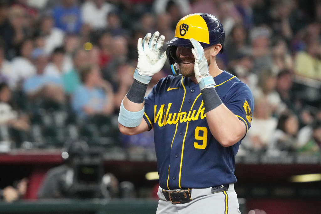 Milwaukee Brewers' Jake Bauers reacts after hitting a two-run home run against the Arizona Diamondbacks in the seventh inning of a baseball game, Sunday, July 5, 2026, in Phoenix. (AP Photo/Rick Scuteri)