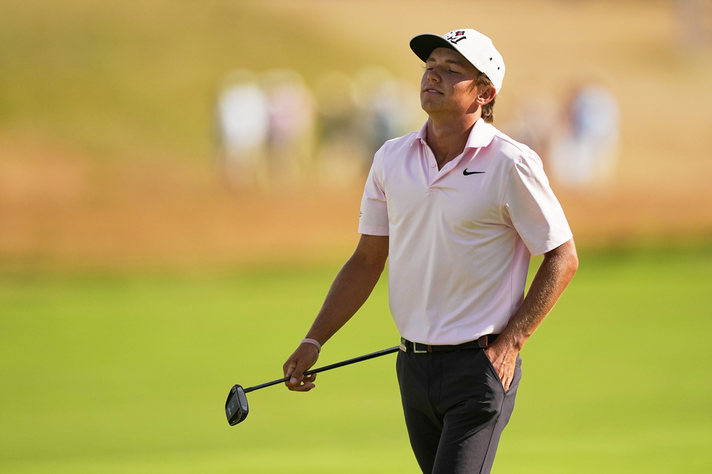 Miles Russell walks off the green on the third hole during the second round of the U.S. Open golf tournament at Shinnecock Hills Golf Club in Southampton, N.Y., Friday, June 19, 2026.(AP Photo/Gerald Herbert)