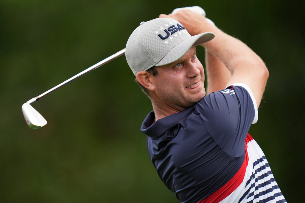 United States' Harris English watches his tee shot on the third hole at Bethpage Black golf course during the Ryder Cup golf tournament, Friday, Sept. 26, 2025, in Farmingdale, N.Y. (AP Photo/Seth Wenig)