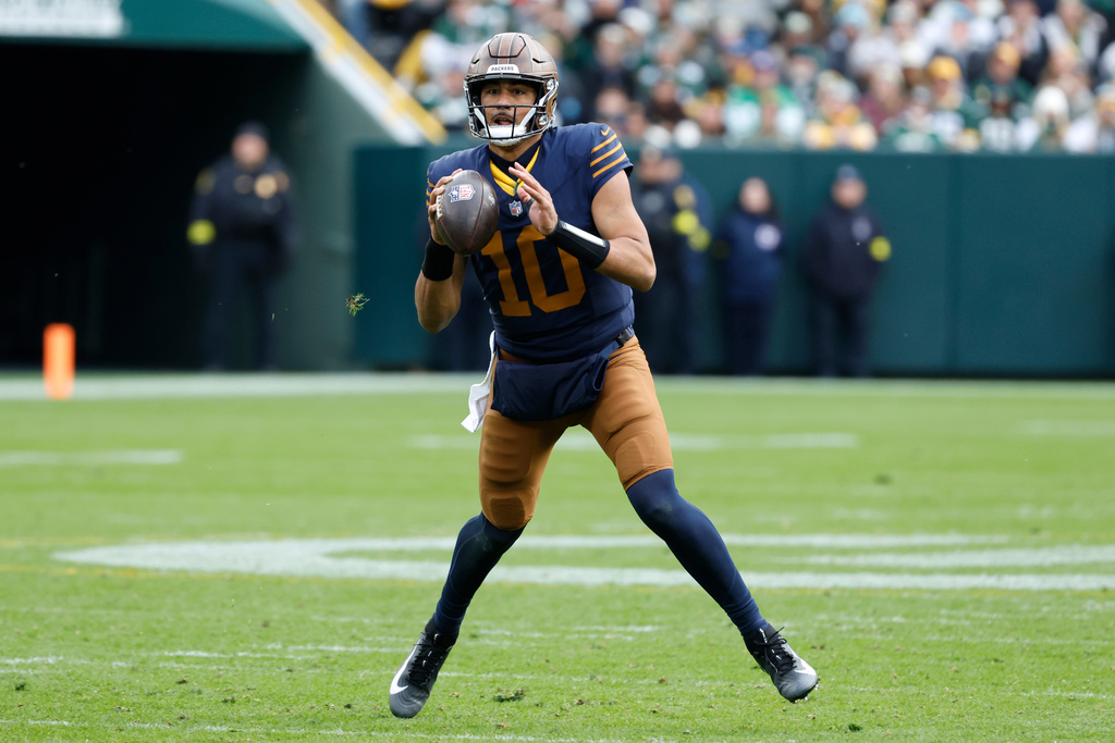 Green Bay Packers quarterback Jordan Love looks to throw against the Carolina Panthers during the second half of an NFL football game Sunday, Nov. 2, 2025, in Green Bay, Wis. (AP Photo/Mike Roemer)