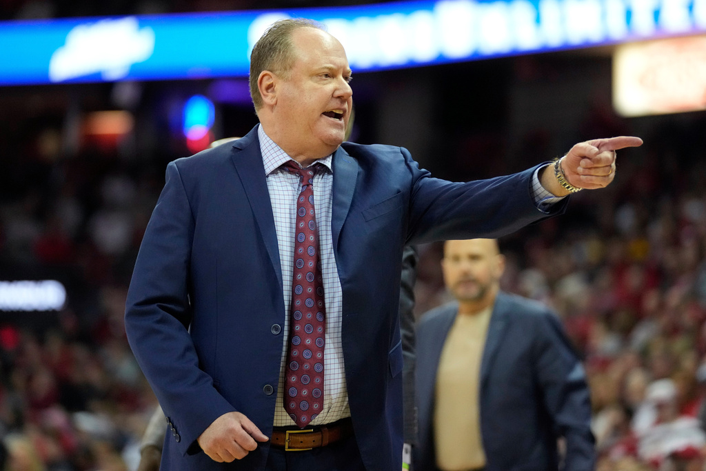 Wisconsin head coach Greg Gard calls a timeout during the first half of an NCAA college basketball game against Minnesota, Wednesday, Jan. 28, 2026, in Madison, Wis. (AP Photo/Kayla Wolf)