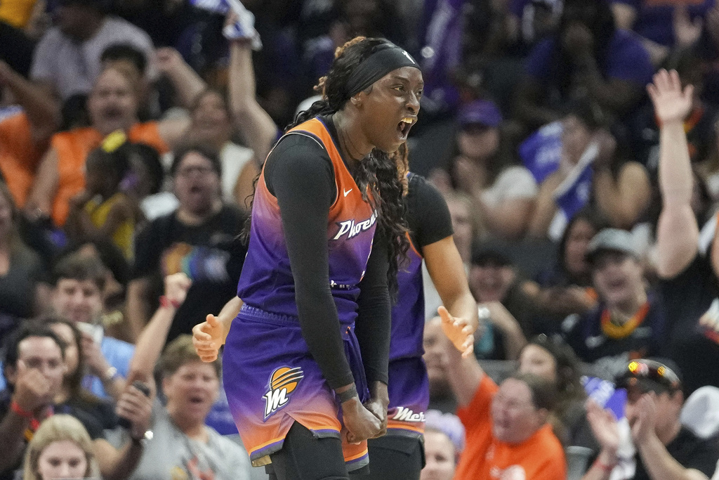 Phoenix Mercury guard Kahleah Copper reacts after getting fouled and completing a three-point play against the New York Liberty during the first half of Game 1 in the first round of the WNBA basketball playoffs Sunday, Sept. 14, 2025, in Phoenix. (AP Photo/Darryl Webb)
