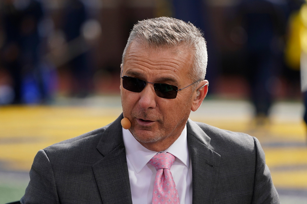 FILE - Urban Meyer, a FOX Sports college football analyst, appears before an NCAA college football game between Michigan and Penn State in Ann Arbor, Mich., Oct. 15, 2022. (AP Photo/Paul Sancya, File)