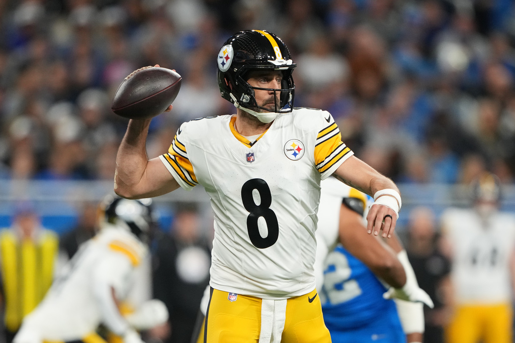 Pittsburgh Steelers' Aaron Rodgers passes during the first half of an NFL football game against the Detroit Lions, Sunday, Dec. 21, 2025, in Detroit. (AP Photo/Ryan Sun)