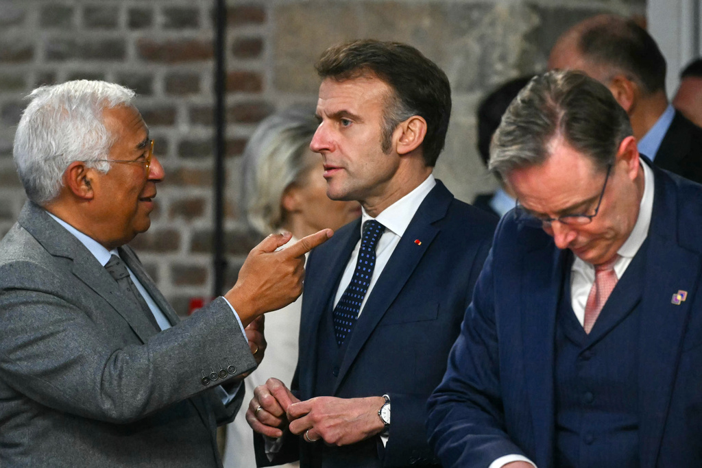 From left, European Council President Antonio Costa, French President Emmanuel Macron and Belgium's Prime Minister Bart De Wever during the EU summit at Alden Biesen Castle in Bilzen-Hoeselt, Belgium, Thursday, Feb. 12, 2026. (Nicolas Tucat, Pool Photo via AP)