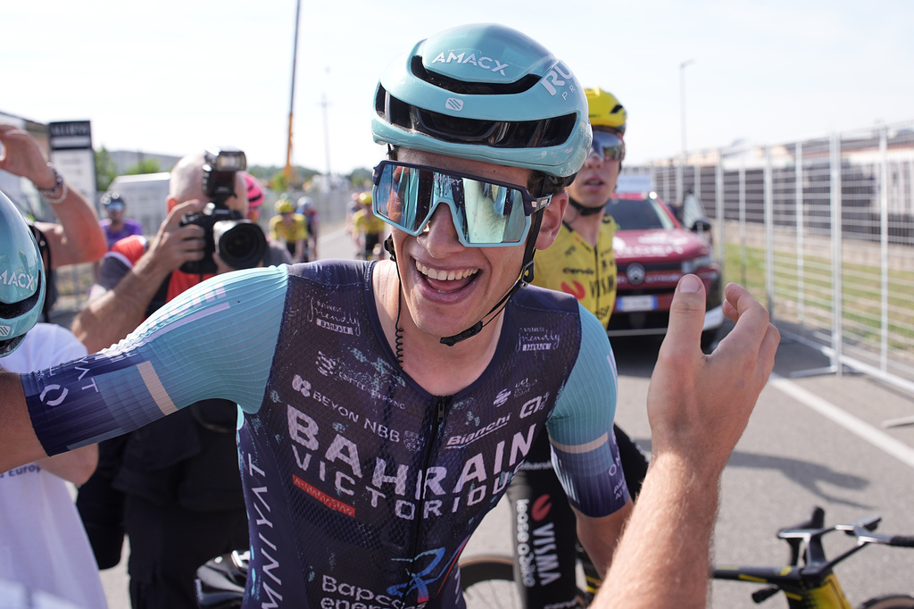 Belgium's Alec Segaert of Bahrain Victorious celebrates winning the 12th stage of the Giro d'Italia cycling race, from Imperia to Novi Ligure, Italy, Thursday, May 21, 2026. (Marco Alpozzi/LaPresse via AP)