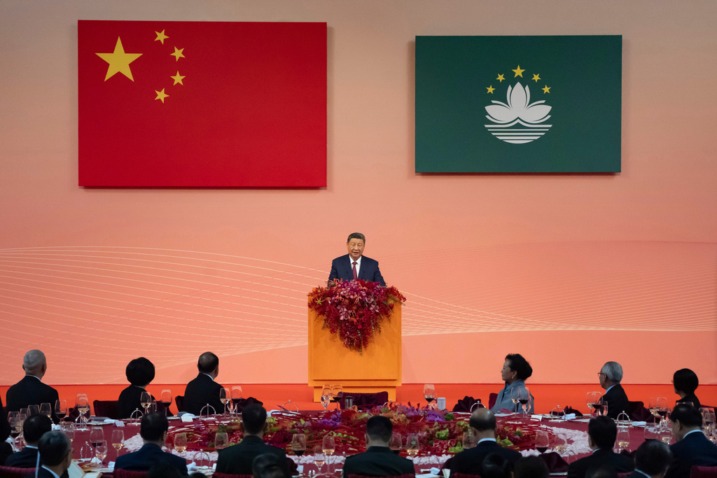 FILE - China President Xi Jinping delivers his speech during a welcoming dinner, ahead of celebrations for the 25th anniversary of Macao's handover from Portugal to China, in Macao, Dec. 19, 2024. (AP Photo/Anthony Kwan, Pool, File)