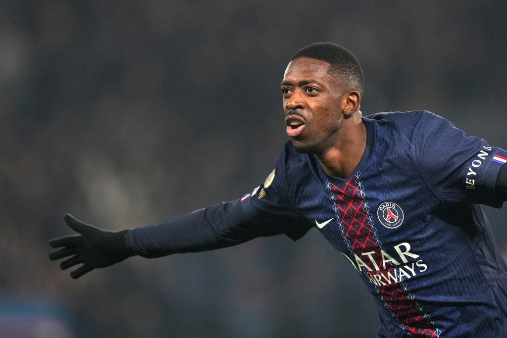 PSG's Ousmane Dembele celebrates after scoring the opening goal during the French League One soccer match between Paris Saint-Germain and Marseille in Paris, Sunday, Feb. 8, 2026. (AP Photo/Thibault Camus)