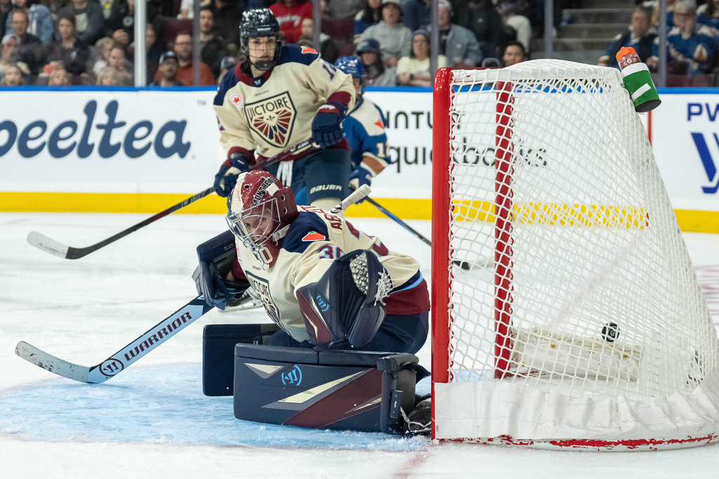 Vancouver Goldeneyes' Claire Thompson, not seen, scores on Montreal Victoire goaltender Sandra Abstreiter (30) during the third period of a PWHL hockey game, in Vancouver, on Tuesday, April 21, 2026. (Ethan Cairns/The Canadian Press via AP)