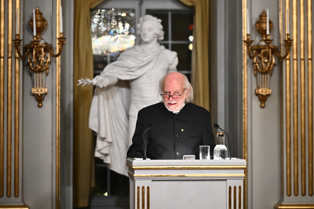 Laszlo Krasznahorkai, Nobel Prize laureate in Literature, delivers his Nobel Prize lecture in Stockholm, Sweden, Sunday Dec. 7, 2025. (Claudio Bresciani/TT News Agency via AP)