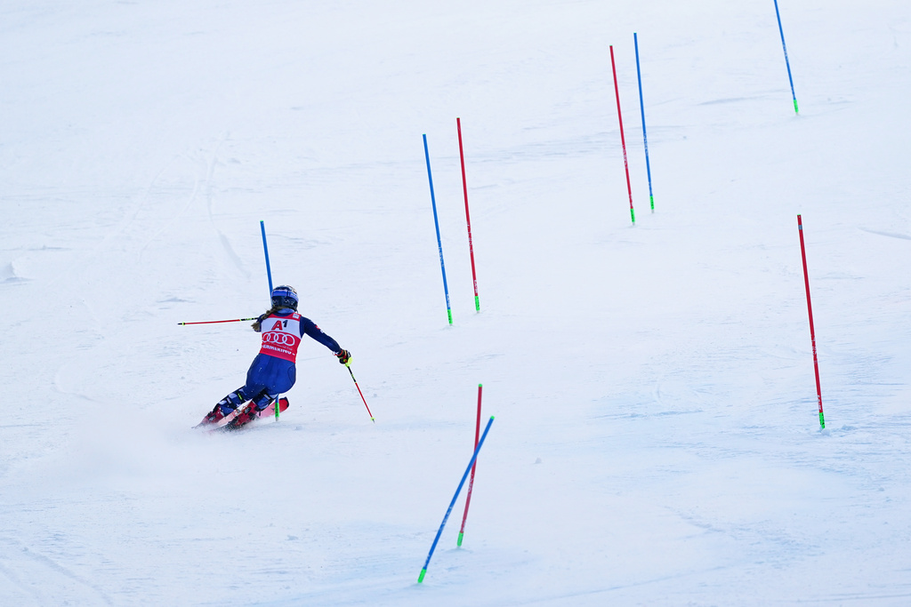United States' Mikaela Shiffrin speeds down the course during an alpine ski, women's World Cup slalom in Semmering, Austria, Sunday, Dec. 28, 2025. (AP Photo/Pier Marco Tacca)