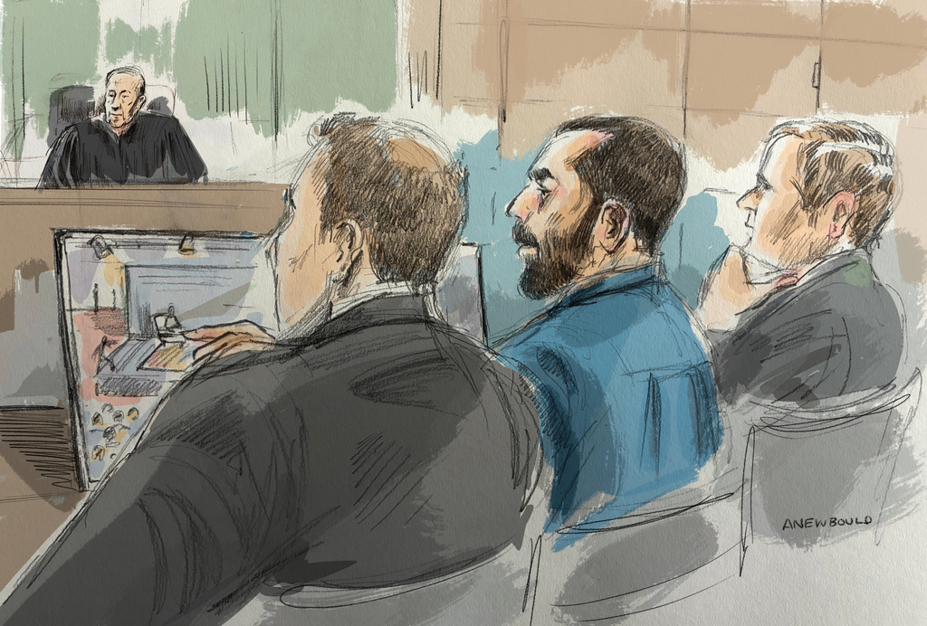 In this courtroom sketch, Hadi Matar, center, sits in federal court during his terrorism trial for his alleged attack on Salman Rushdie, Wednesday, July 22, 2026, in Buffalo, N.Y. (Alexandra Newbould via AP)