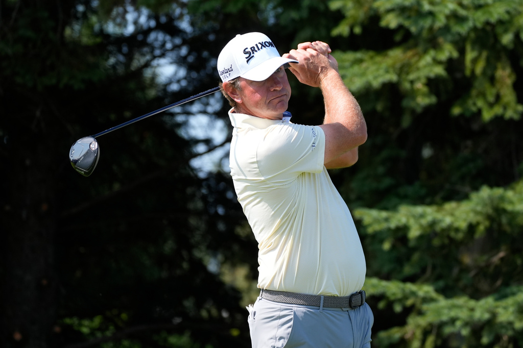 Lucas Glover hits from the second tee during the first round of the 3M Open golf tournament at the Tournament Players Club Thursday, July 23, 2026, in Blaine, Minn. (AP Photo/Bruce Kluckhohn)