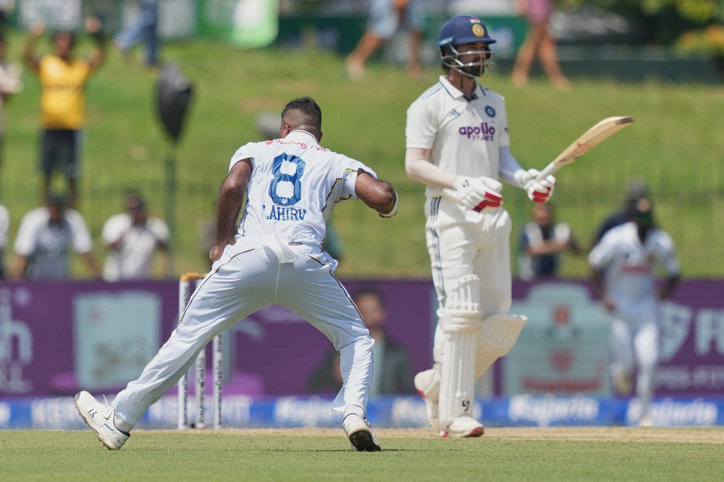 Sri Lanka's Lahiru Kumara, left, celebrates taking the wicket of India's KL Rahul during day one of the second cricket test match between Sri Lanka and India in Colombo, Sri Lanka, Sunday, Aug. 23, 2026. (AP Photo/Eranga Jayawardena)