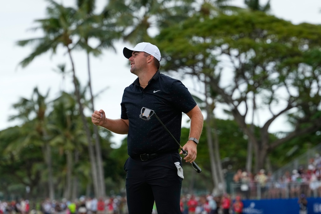 Chris Gotterup reacts after winning the Sony Open golf event at the Waialae Country Club in Honolulu, Sunday, Jan. 18, 2026. (AP Photo/Matt York)