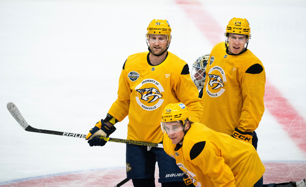 Nashville Predators Steven Stamkos, top left, Spencer Stastney and Erik Haula during a training in Stockholm, Sweden, Wednesday, Nov. 12, 2025, two days ahead of their NHL hockey match against Pittsburg Penguins. (Claudio Bresciani/TT News Agency via AP)