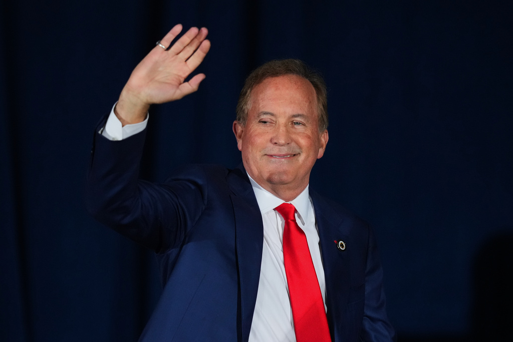 Texas Attorney General Ken Paxton, a Republican candidate for the U.S. Senate waves to supporters at an election night primary watch party on Tuesday, March 3, 2026, in Dallas. (AP Photo/Julio Cortez)