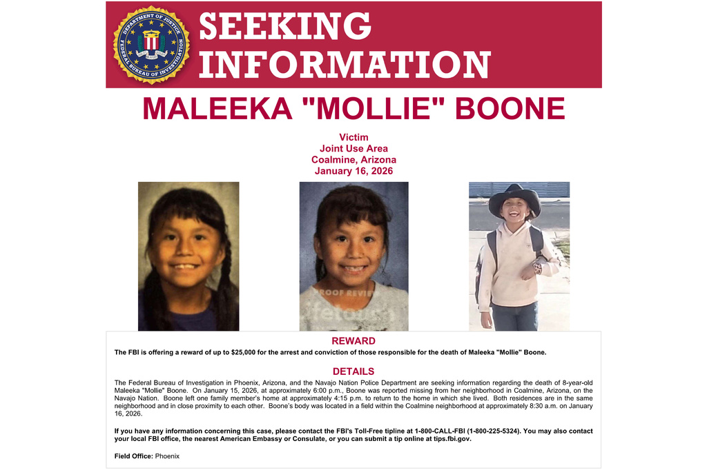 This image shows part of a "Seeking Information" notice released by the Federal Bureau of Investigation regarding Maleeka “Mollie” Boone, an 8-year-old girl whose body was found on tribal lands in northern Arizona last month after she was reported missing was likely struck by a passing vehicle. (FBI via AP)