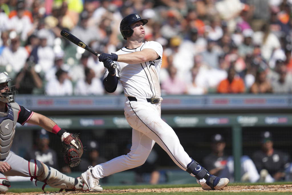 Detroit Tigers' Colt Keith hits a one-run double against the Cleveland Guardians during the second inning of a baseball game Thursday, Sept. 18, 2025, in Detroit. (AP Photo/Paul Sancya)