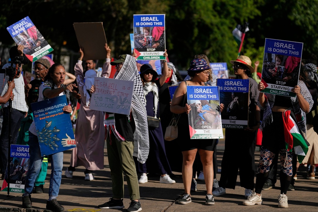 FILE - Activist protesting outside the Israel Embassy in Pretoria, South Africa, Friday, Oct. 3, 2025. (AP Photo/Themba Hadebe, File)