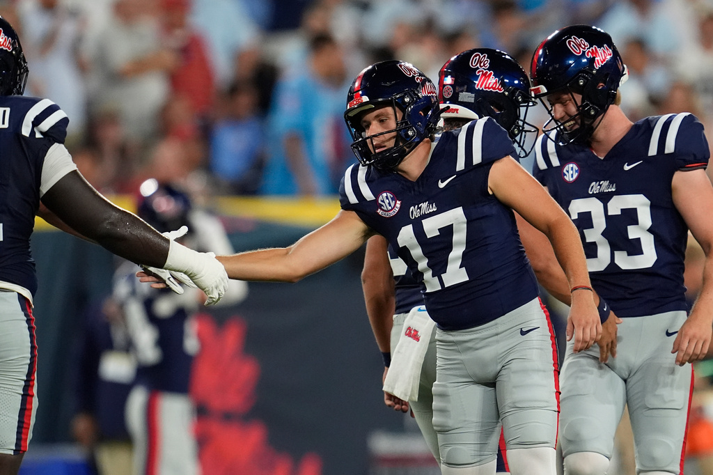 Mississippi kicker Lucas Carneiro (17) celebrates a field goal during the first half of an NCAA college football game against Louisville, Sunday, Sept. 6, 2026, in Nashville, Tenn. (AP Photo/George Walker IV)