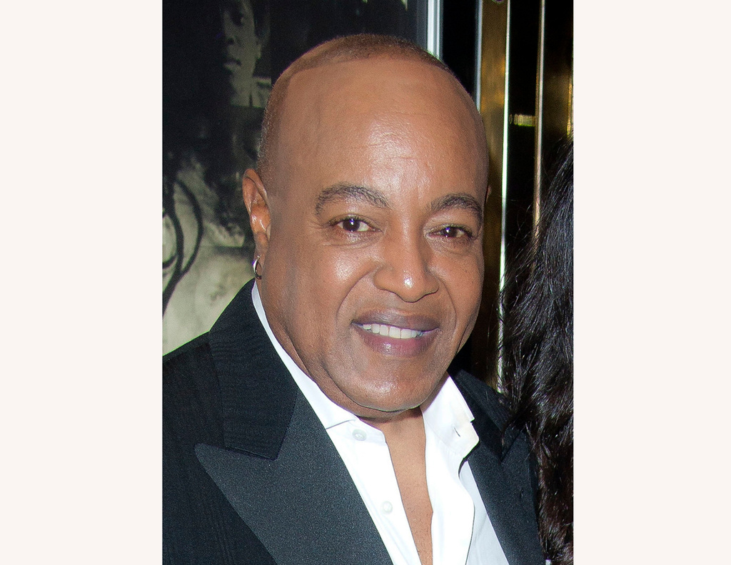 FILE - Peabo Bryson smiles at the European premiere of "Michael Jackson: The Life Of An Icon," in London, Nov. 2, 2011. (AP Photo/Joel Ryan, File)