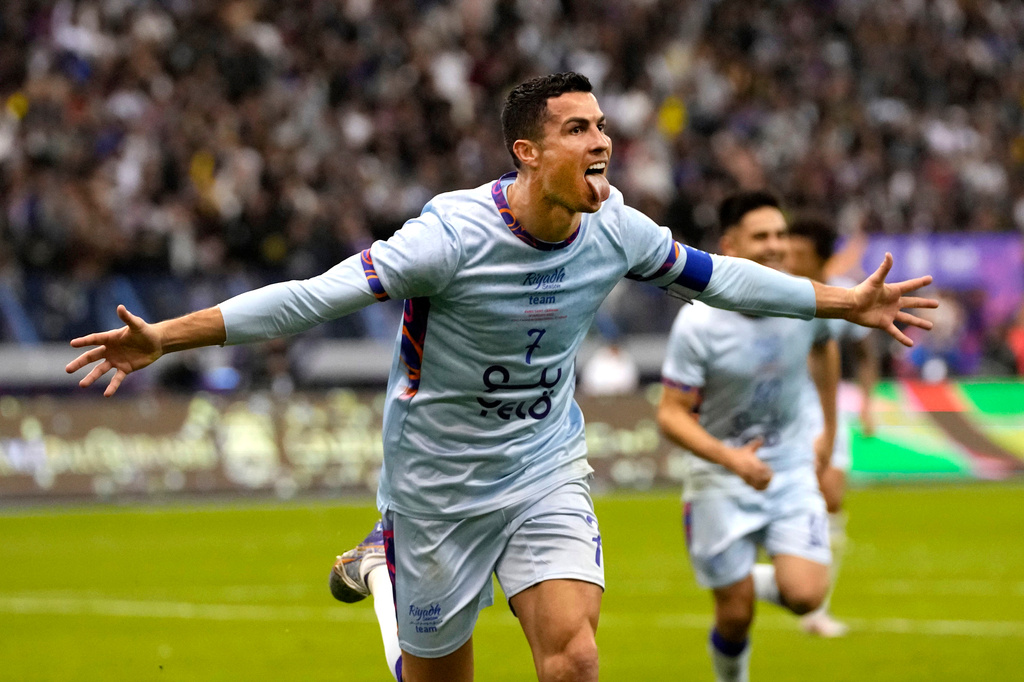 FILE - Al Nassr's Cristiano Ronaldo celebrates after scoring at the King Saud University Stadium, in Riyadh, Saudi Arabia, Jan. 19, 2023. (AP Photo/Hussein Malla, file)