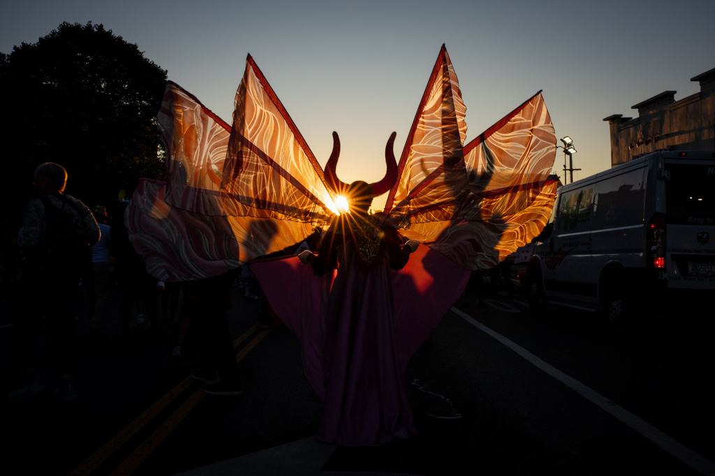 People participate in J'Ouvert festivities ahead of the West Indian Day Parade at sunrise on Labor Day in the Crown Heights and Flatbush neighborhoods of Brooklyn, Monday, Sept. 7, 2026, in New York. (AP Photo/Angelina Katsanis)