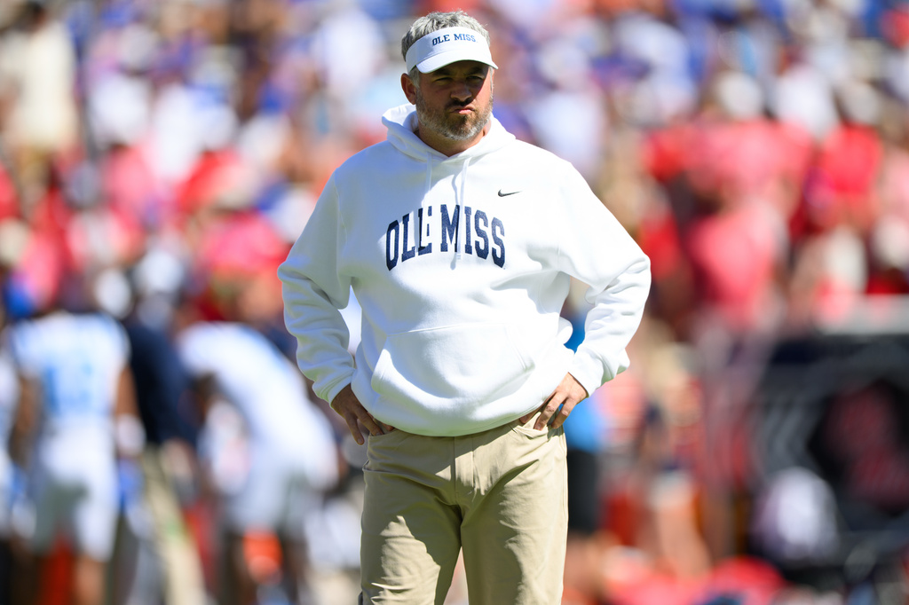Mississippi head coach Pete Golding walks the field during warm ups before an NCAA college football game against Florida, Saturday, Sept. 26, 2026, in Gainesville, Fla. (AP Photo/Noah Lantor)