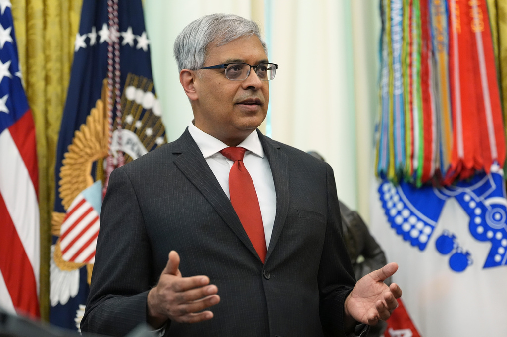 National Institutes of Health Director Dr. Jay Bhattacharya speaks during a meeting to sign an executive order about vaccines, Monday, Aug. 10, 2026, in the Oval Office of the White House in Washington. (AP Photo/Jacquelyn Martin)