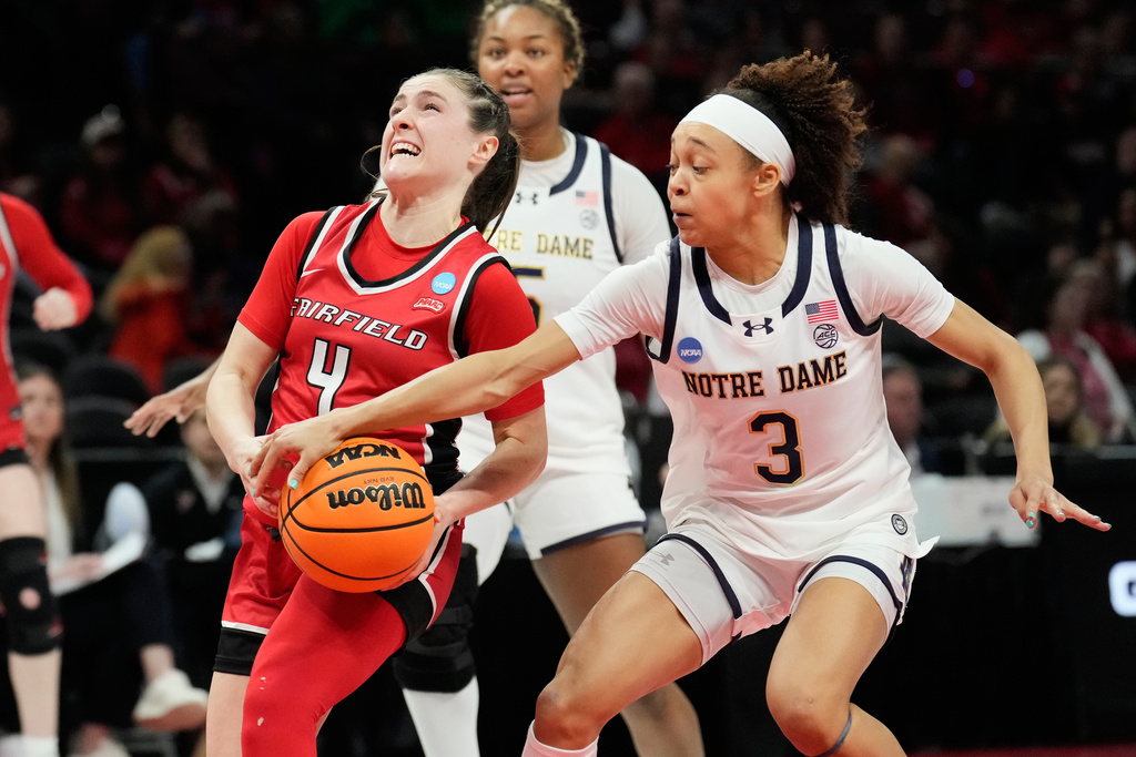 Notre Dame guard Hannah Hidalgo (3) knocks the ball away from Fairfield guard Kaety L'amoreaux (4) in the second half in the first round of the NCAA college basketball tournament, Saturday, March 21, 2026, in Columbus, Ohio. (AP Photo/Sue Ogrocki)