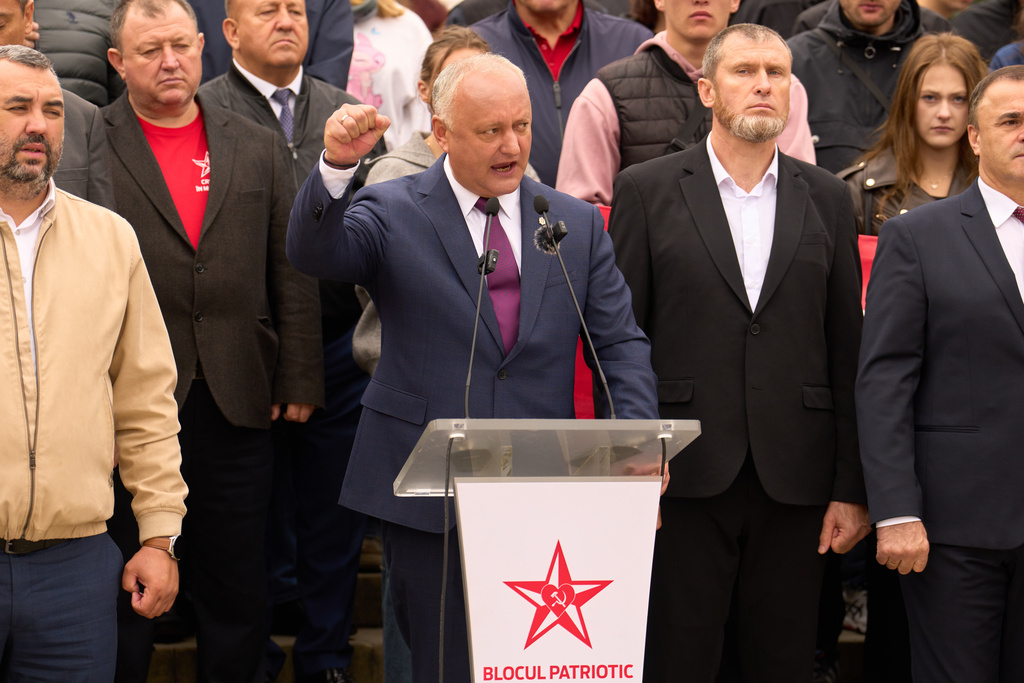 Former President Igor Dodon gestures while speaking at a rally of the Russia-friendly Patriotic Electoral Bloc in Chisinau, Moldova, Thursday, Sept. 25, 2025, ahead of parliamentary elections taking place on Sept. 28. (AP Photo/Vadim Ghirda)