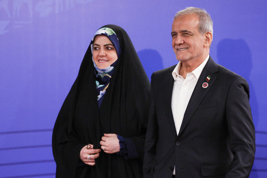 Iran's President Masoud Pezeshkian and his daughter Zahra attend the opening ceremony of the World Nomad Games, in Bishkek, Kyrgyzstan, on Monday, Aug. 31, 2026. (Vyacheslav Prokofyev, Sputnik, Kremlin Pool Photo via AP)
