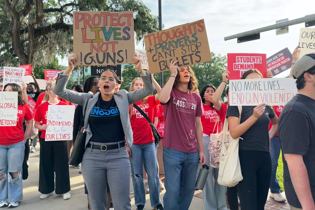 FILE - Students and activists rally for gun control policies outside of Florida's historic old capitol on Wednesday, April 23, 2025 in Tallahassee, Fla., less than a week after a deadly shooting at Florida State University. (AP Photo/Kate Payne, File)