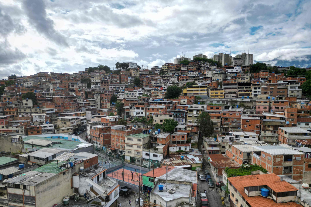 Homes cover a hill in Las Minas de Baruta neighborhood of Caracas, Venezuela, June 22, 2025. (AP Photo/Matias Delacroix)