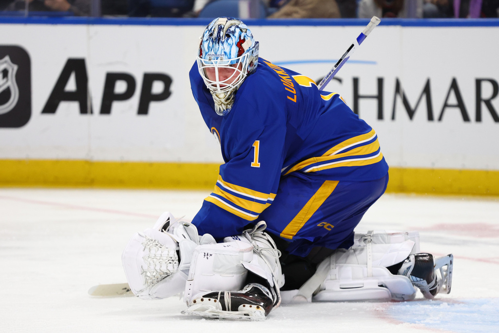 Buffalo Sabres goaltender Ukko-Pekka Luukkonen (1) watches the puck go wide during the second period of an NHL hockey game against the Washington Capitals Saturday, Nov. 1, 2025, in Buffalo, N.Y. (AP Photo/Jeffrey T. Barnes)