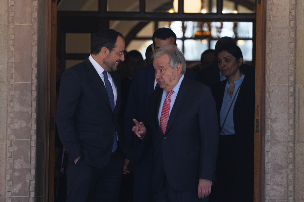 United Nations Secretary General Antonio Guterres, right, speaks with Cyprus' President Nikos Christodoulides, as he leaves the presidential palace and after their meeting, in divided capital Nicosia, Cyprus, on Tuesday, July 28, 2026. (AP Photo/Petros Karadjias)