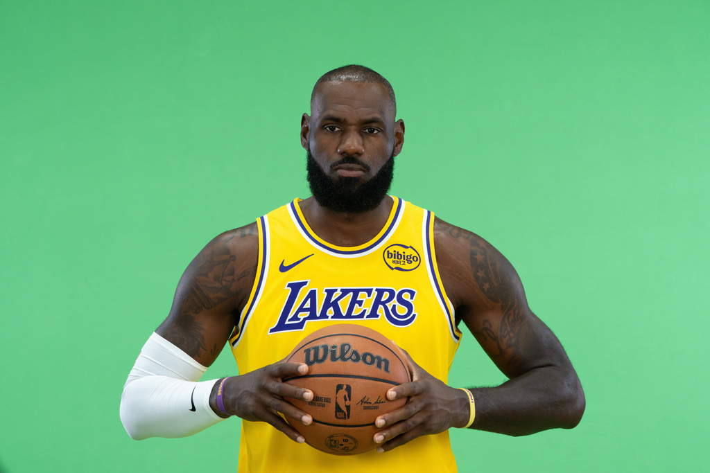 Los Angeles Lakers' LeBron James poses for photos during the NBA basketball team's media day in El Segundo, Calif., Monday, Sept. 29, 2025. (AP Photo/Jae C. Hong)
