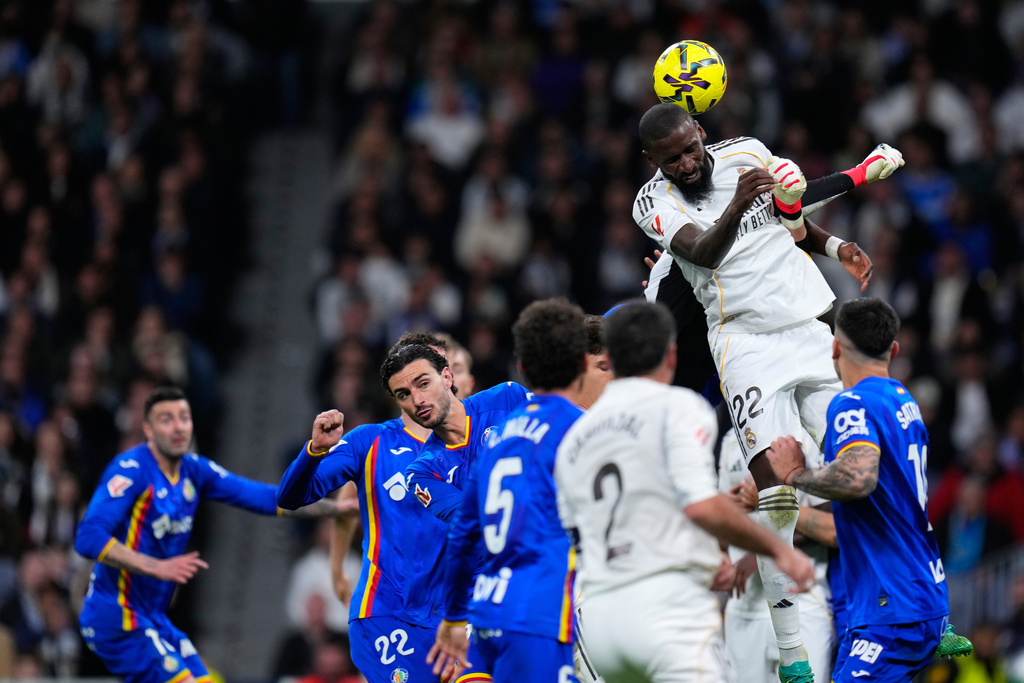 Real Madrid's Antonio Rudiger jumps for the ball during a Spanish La Liga soccer match between Real Madrid and Getafe in Madrid, Spain, Monday, March 2, 2026. (AP Photo/Manu Fernandez)