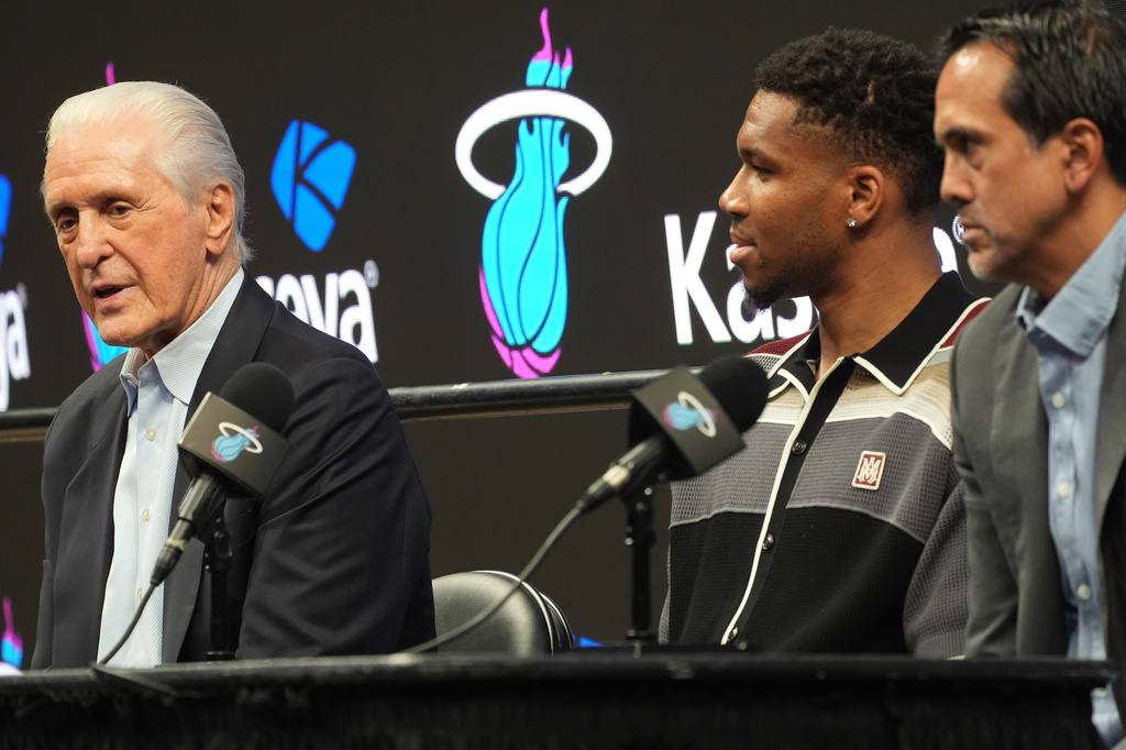 Miami Heat President Pat Riley, left, speaks, as head coach Erik Spoelstra, right, and Giannis Antetokounmpo listen during a news conference where Antetokounmpo is introduced as a new member of the team Thursday, July 16, 2026, in Miami. (AP Photo/Marta Lavandier)