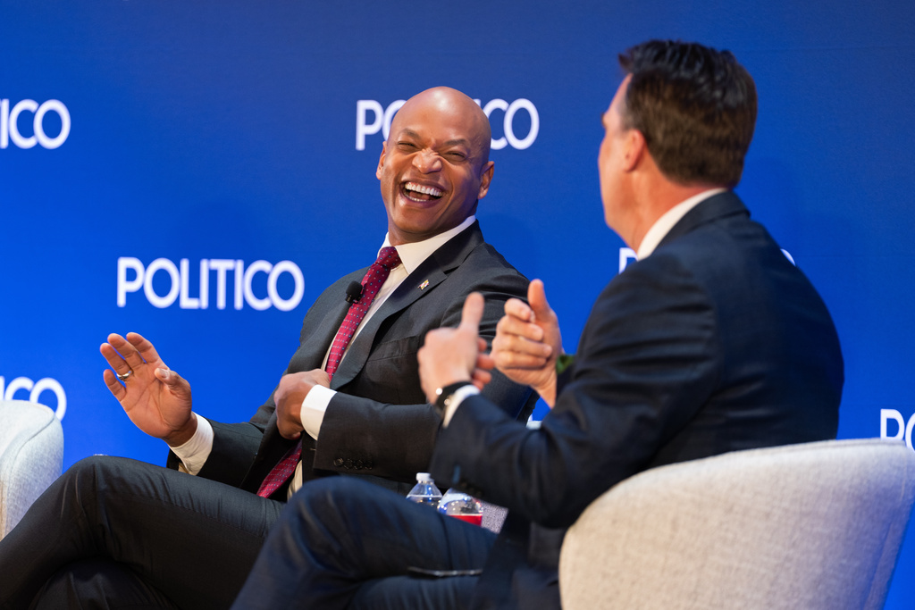 Maryland Gov. Wes Moore laughs with Oklahoma Gov. Kevin Stitt at an event at the National Governors Association Winter Meeting, Thursday, Feb. 19, 2026, in Washington. (AP Photo/Allison Robbert)