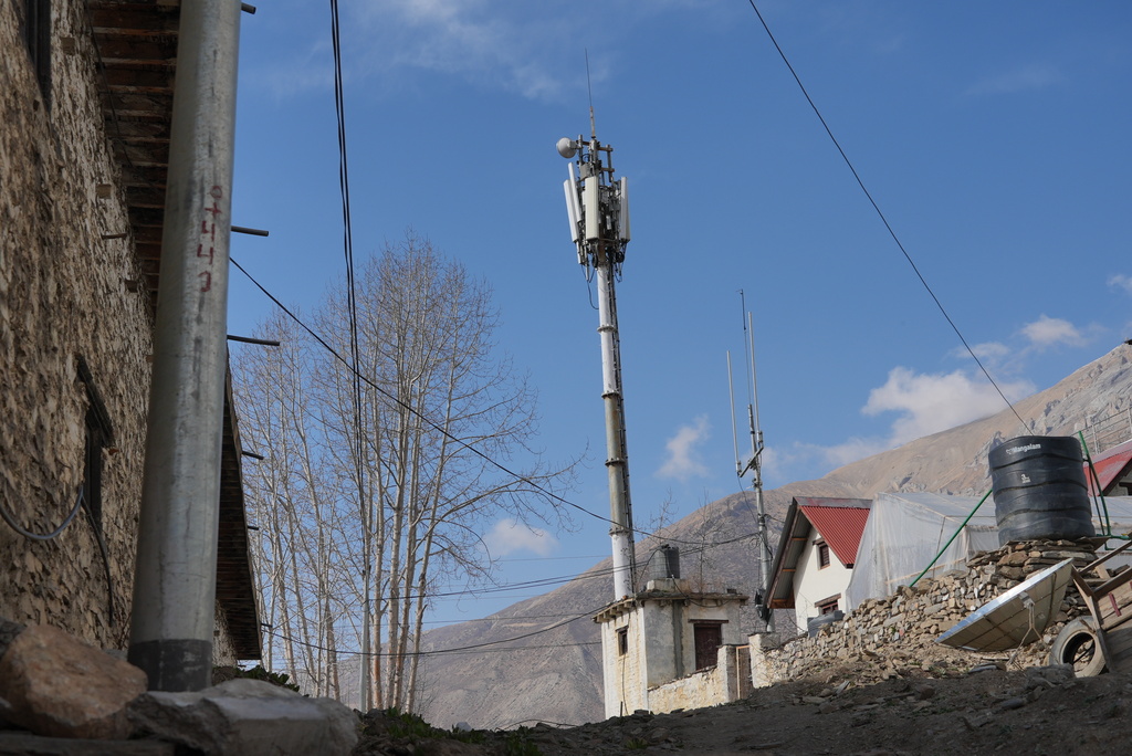 A Nepal Telecom cell tower wired with Chinese equipment stands near Sree Muktinath temple in the remote Himalayan town of Ranipauwa, Nepal, April 16, 2025. (AP Photo/Dake Kang)