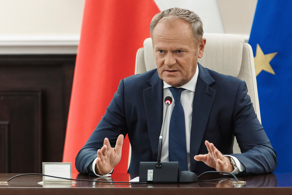 FILE - Polish Prime Minister Donald Tusk holds an extraordinary government meeting at the chancellery, with military and emergency services officials, following violations of Polish airspace during a Russian attack in Warsaw, Poland, on Sept. 10, 2025. (Chancellery of the Prime Minister of Poland via AP, File)