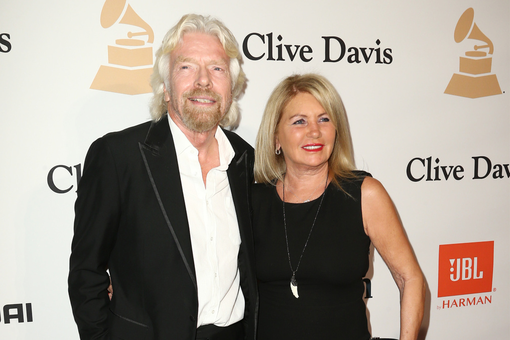 FILE - Richard Branson, left, and Joan Templeman Branson appear at the 2016 Clive Davis Pre-Grammy Gala, in Beverly Hills, Calif., Feb. 14, 2016. (Photo by John Salangsang/Invision/AP, File)