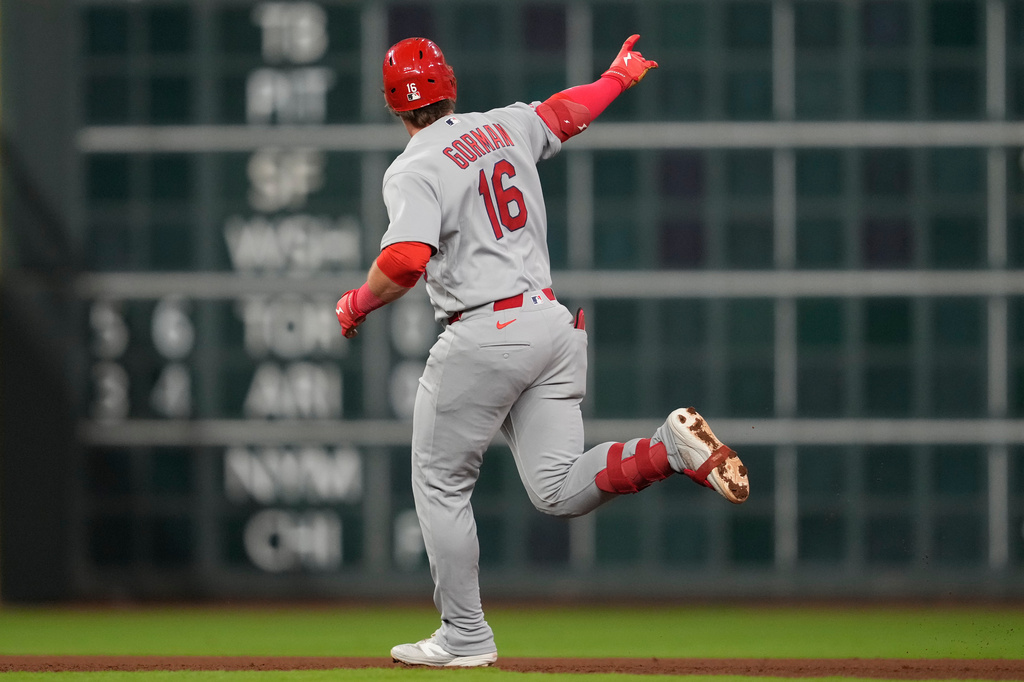 St. Louis Cardinals' Nolan Gorman celebrates as he runs the bases after hitting a home run during the seventh inning of a baseball game against the Houston Astros in Houston, Friday, April 17, 2026. (AP Photo/Ashley Landis)