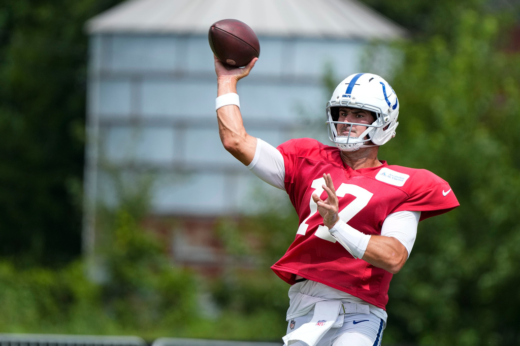 Indianapolis Colts quarterback Daniel Jones (17) throws during a joint practice with the Atlanta Falcons at the team's NFL football training camp in Westfield, Ind., Wednesday, Aug. 19, 2026. (AP Photo/Michael Conroy)