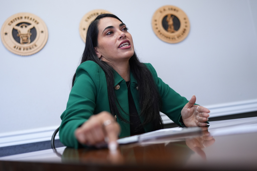 Rep. Mayra Flores, R-Texas, left, visits at a coffee shop, in Corpus Christi, Texas, Wednesday, Feb. 11, 2026. (AP Photo/Eric Gay)
